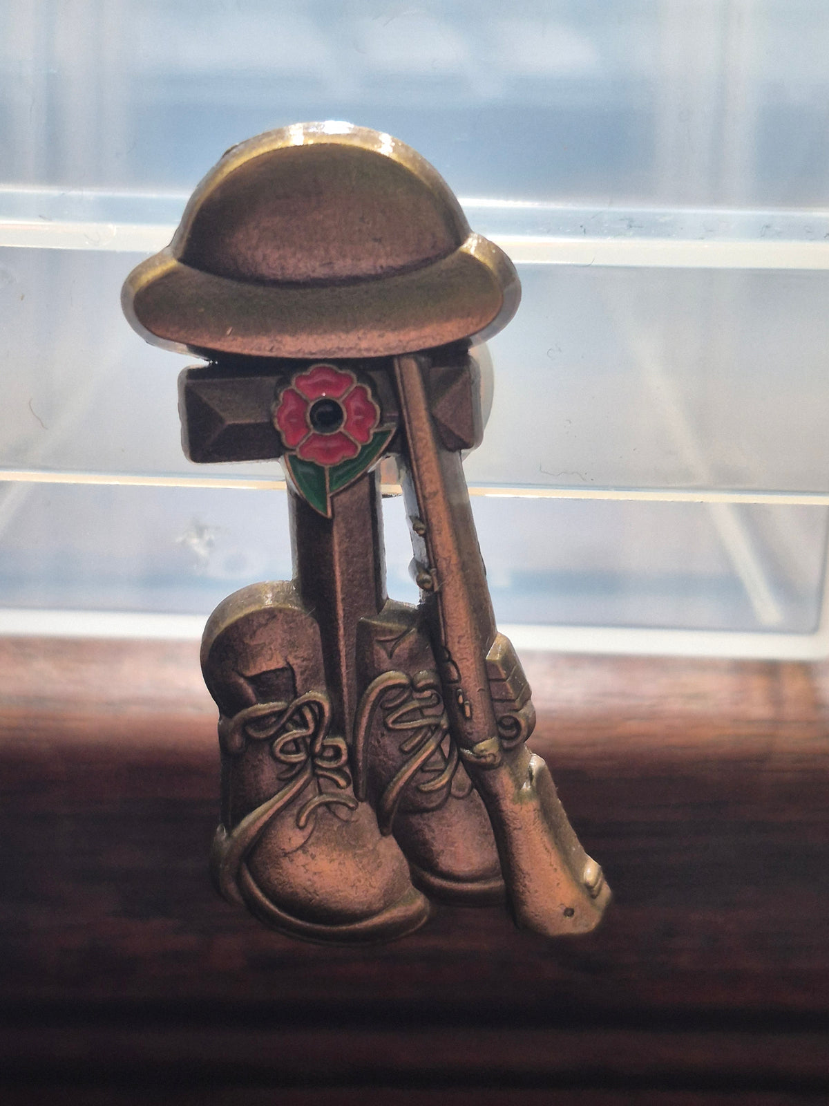 Lapel badge, Boots, Helmet and Rifles