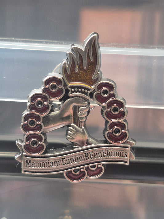 Lapel badge, Memoriam Eorum Retinebimus